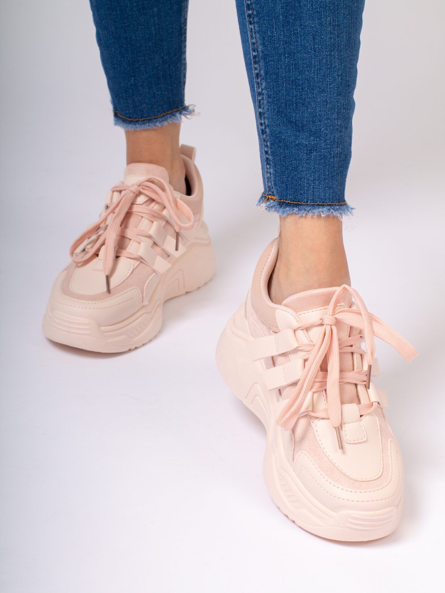 Rosa Sneaker mit Plateausohle